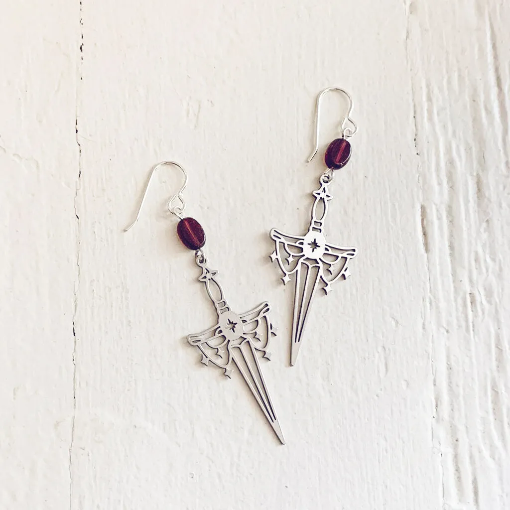 anelace // brass or steel garnet and dagger earrings