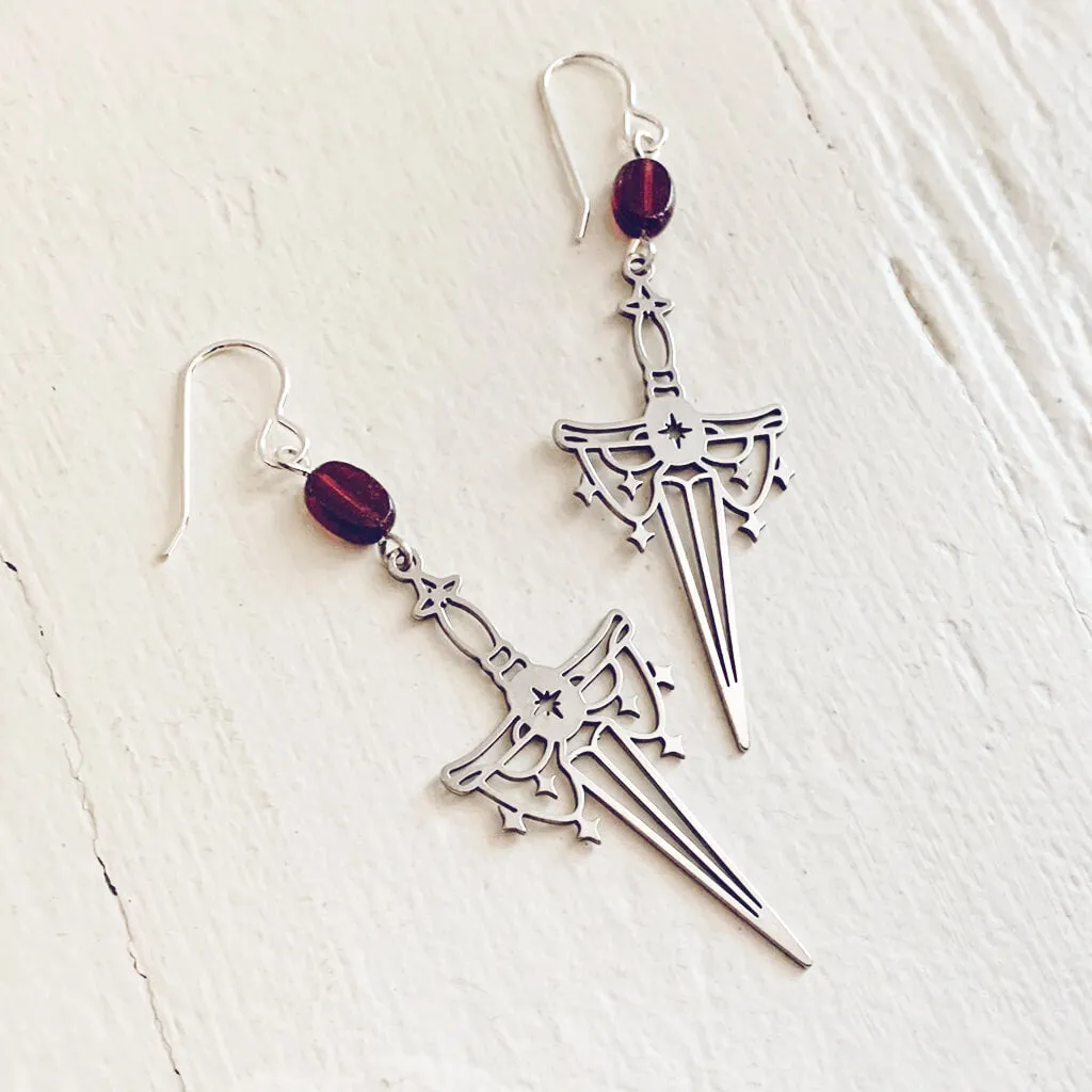 anelace // brass or steel garnet and dagger earrings