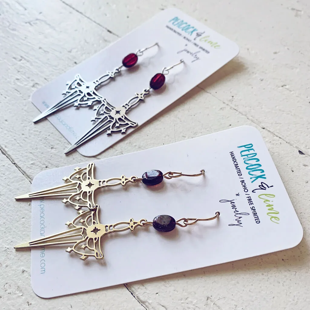 anelace // brass or steel garnet and dagger earrings