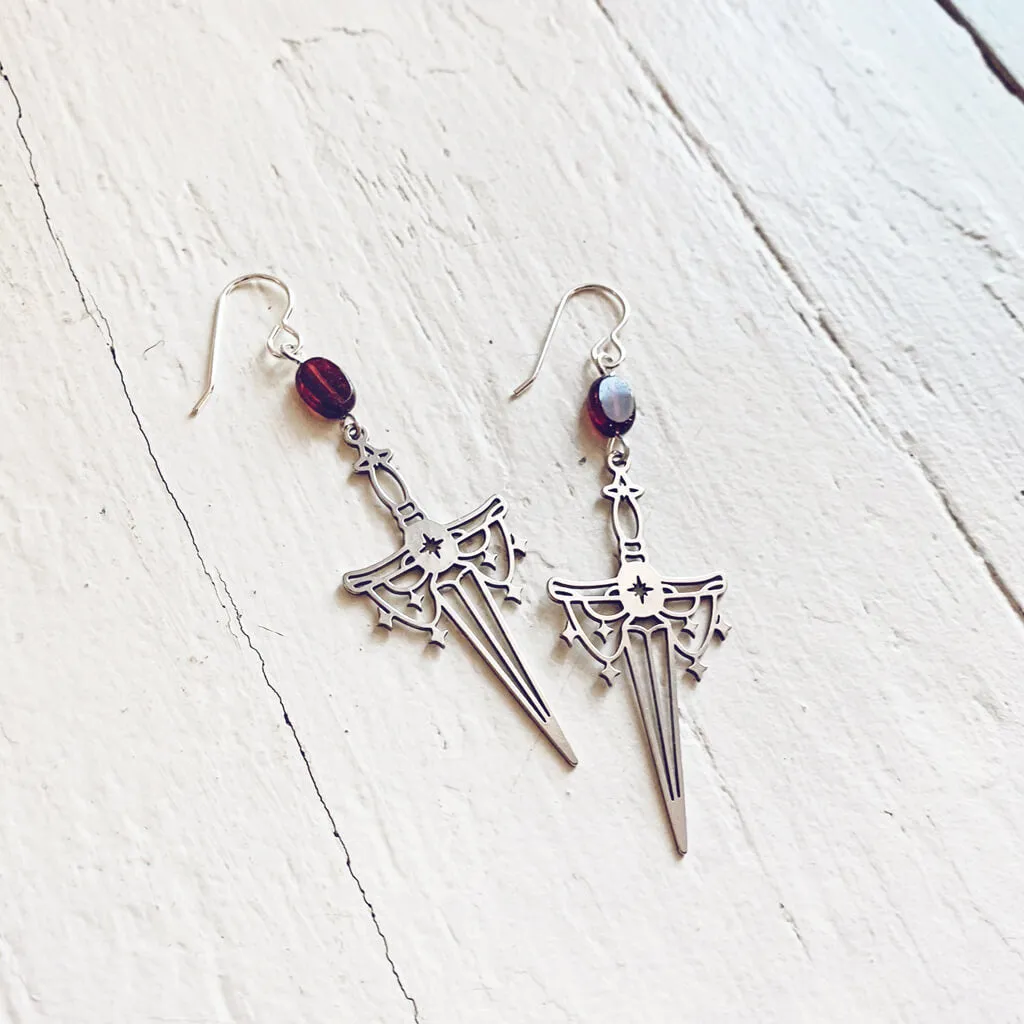 anelace // brass or steel garnet and dagger earrings